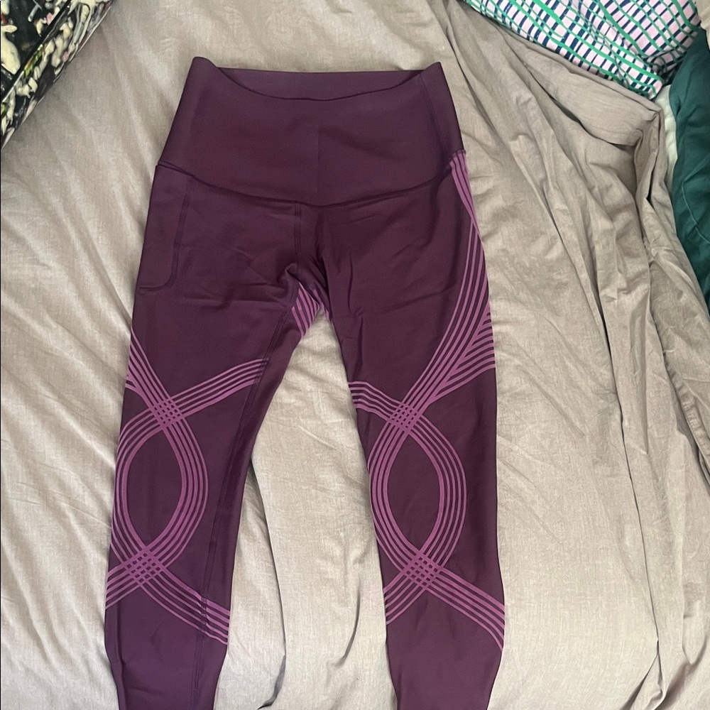 High-Waist Plum Leggings with Pink Graphic Detail